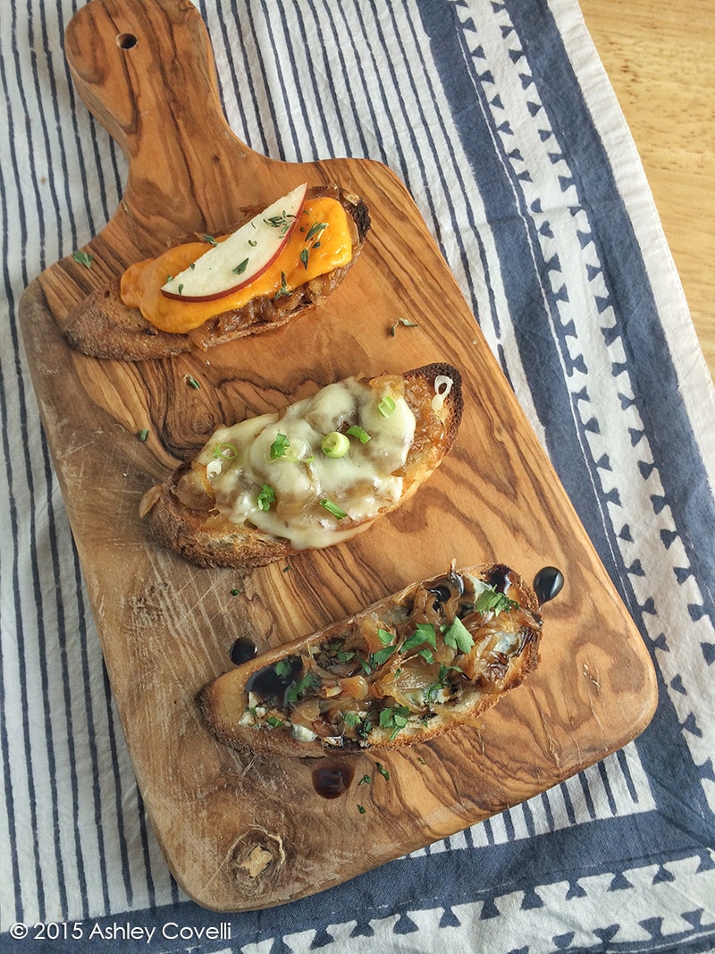 French Cheese + Carmalized Onion Crostini Trio