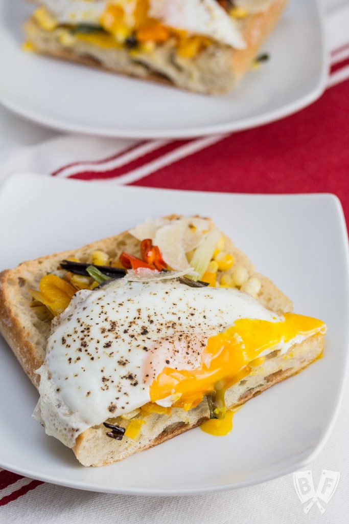 Charred Veggie Ciabatta Pizza with Crispy Fried Eggs + Parmesan: Fire up your broiler for this colorful sheet pan meal!