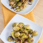 Plates of Mustard Roasted Brussels Sprouts with Capers.