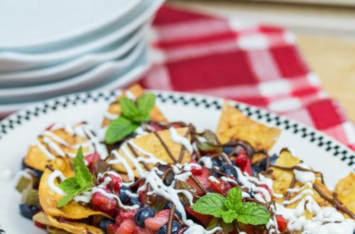 Dessert Nachos with Fresh Baked Cinnamon Tortilla Chips: A colorful fresh fruit salsa, honeyed Greek yogurt + chocolate hazelnut butter are piled atop this plate of sweet-and-salty nachos! #StonyfieldBlogger