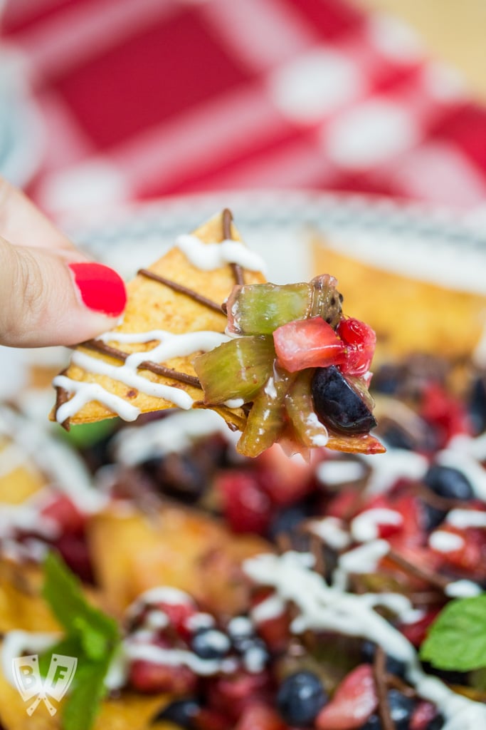 Dessert Nachos with Fresh Baked Cinnamon Tortilla Chips: A colorful fresh fruit salsa, honeyed Greek yogurt + chocolate hazelnut butter are piled atop this plate of sweet-and-salty nachos! #StonyfieldBlogger