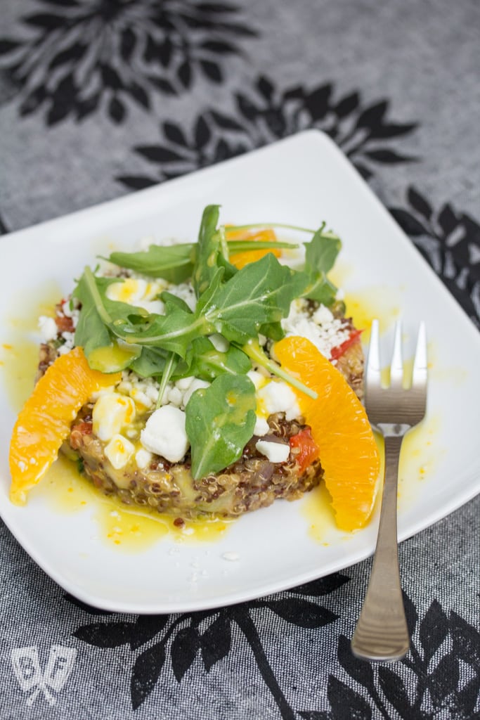 Pax Romana's Quinoa Salad with Mixed Vegetable, Goat Cheese & Orange Dressing: No more boring quinoa salad recipes! Fresh orange zest and juice go into the bold, bright vinaigrette for this beautifully plated restaurant recipe. #BigFlavorsFromARestaurantKitchen