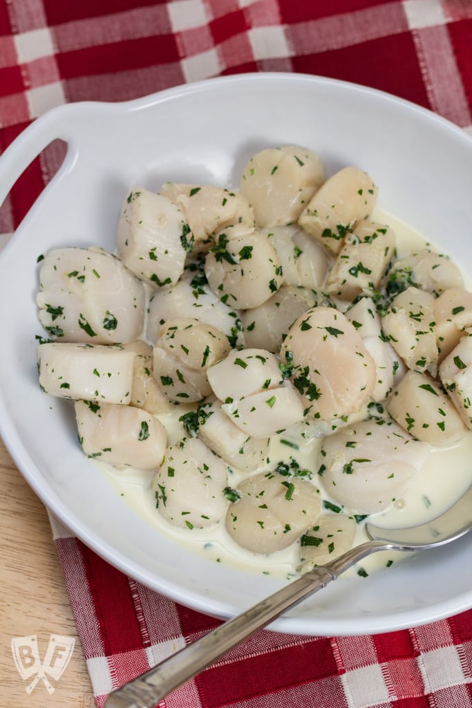 Julia Child's Wine Poached Sea Scallops Poached with Fines Herbes: A quick-and-easy, elegant seafood course that's sure to impress!