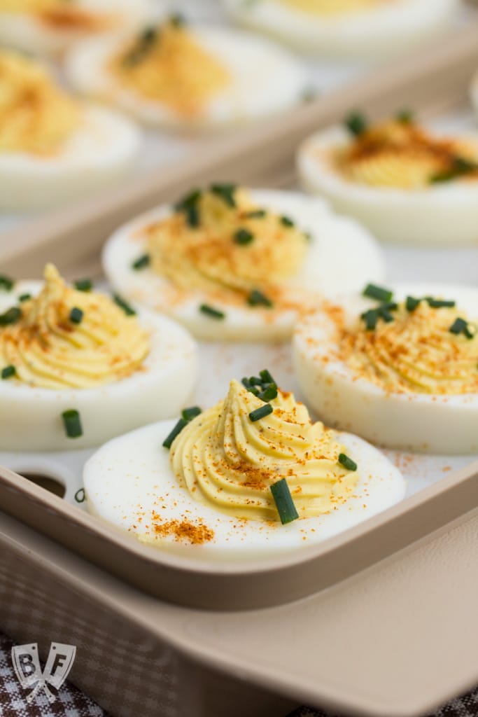 Deviled eggs in a serving tray.