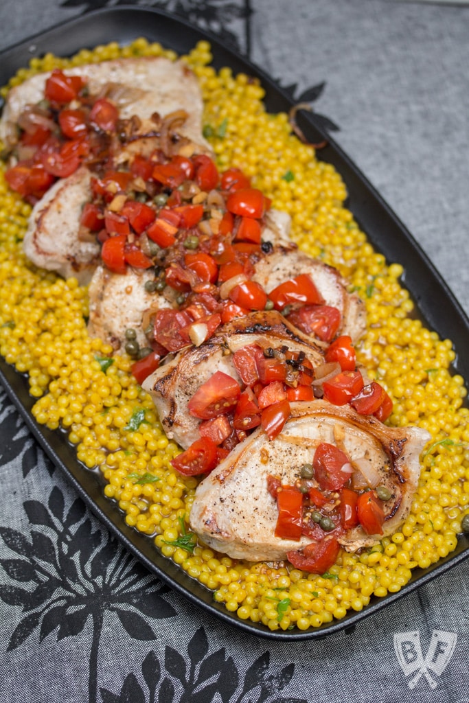 Pork Chops and Couscous with Tomato-Caper Sauce: This quick, colorful meal is perfect for busy weeknights when you want a homemade meal without a lot of effort.