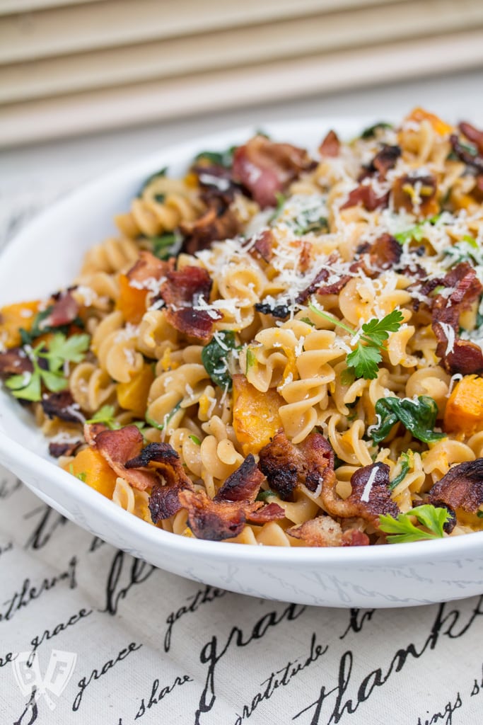 Red Lentil Fusilli with Bacon, Butternut Squash, & Spinach: Vibrant pasta made from red lentils brings a boost of protein and fiber to this scrumptious, salty-sweet bowl of comfort food.