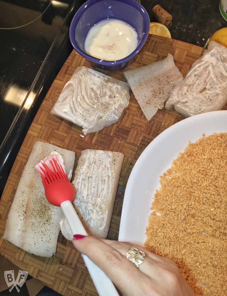 Lemony Almond Crusted Cod with Homemade Mayo-Free Tartar Sauce: Cod is coated with ground almonds and pan fried till beautifully flaky & tender in this delicious seafood recipe. Serve with my easy homemade tartar sauce! #StonyfieldBlogger #ad