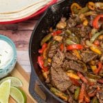 Our Favorite Steak Fajitas: These tender steak fajitas are one of my family's very favorite meals - a perfect Tex-Mex dinner made in a single cast iron skillet.