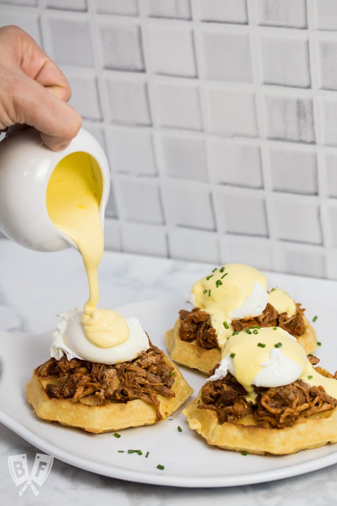 Thick, fluffy waffles are the perfect base for this sweet-and-salty BBQ pulled pork eggs Benedict topped with blender hollandaise sauce. #LeggoMyEggo #HearTheNews #CollectiveBias #shop #ad