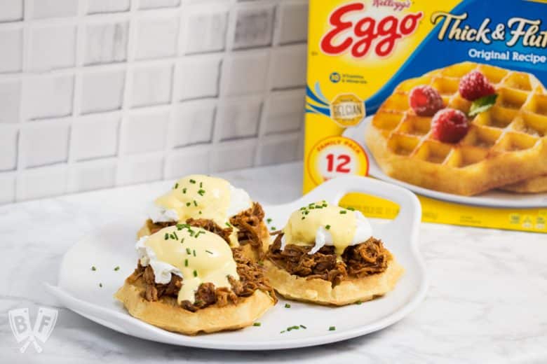 Thick, fluffy waffles are the perfect base for this sweet-and-salty BBQ pulled pork eggs Benedict topped with blender hollandaise sauce. #LeggoMyEggo #HearTheNews #CollectiveBias #shop #ad