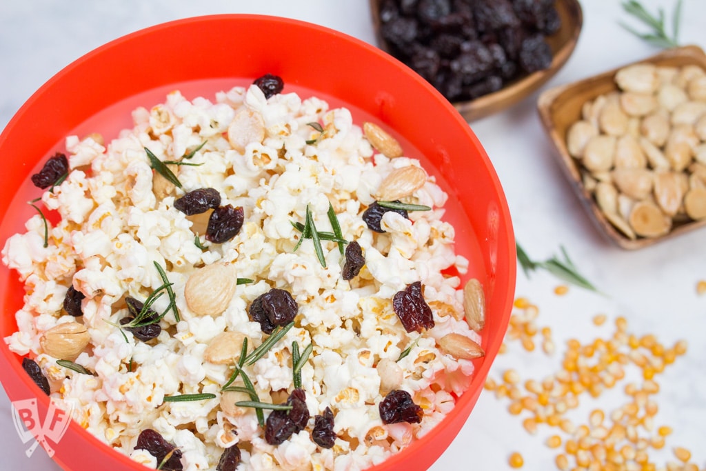 Marcona Almond + Dried Cherry Popcorn with Crispy Rosemary: Upgrade your date night with an upscale twist on classic movie theater popcorn. Make it right in the comfort of your own home with only 6 ingredients! #ad #popwithbarleans