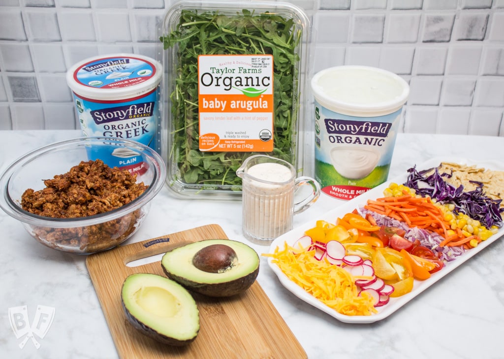 Taco Salad with Homemade Chipotle Ranch Dressing (#ad) is a healthier spin on Taco Tuesday that still packs lots of Mexican flavor. The homemade taco seasoning and chipotle ranch come together in a snap! #StonyfieldBlogger