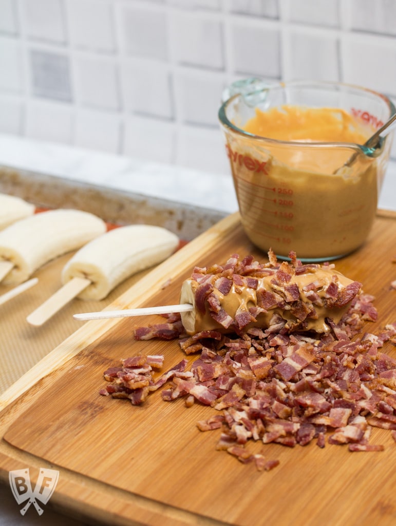 Elvis-Style Frozen Bananas take the classic Elvis sandwich (peanut butter, banana + bacon) to a new level! This easy 3 ingredient frozen dessert is fit for The King! #BaconMonth