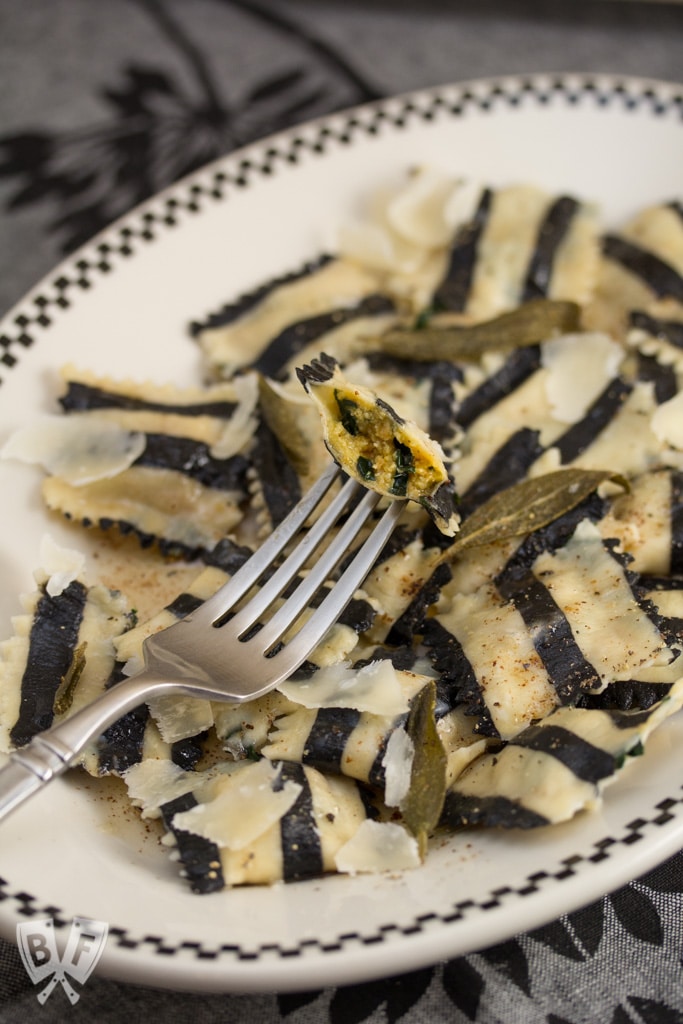 Ghost with the Most Roasted Sweet Potato Ravioli: Homemade black + white pasta is stuffed with roasted veggies, topped with brown butter sauce & crispy sage leaves in my Halloween tribute to Beetlejuice!