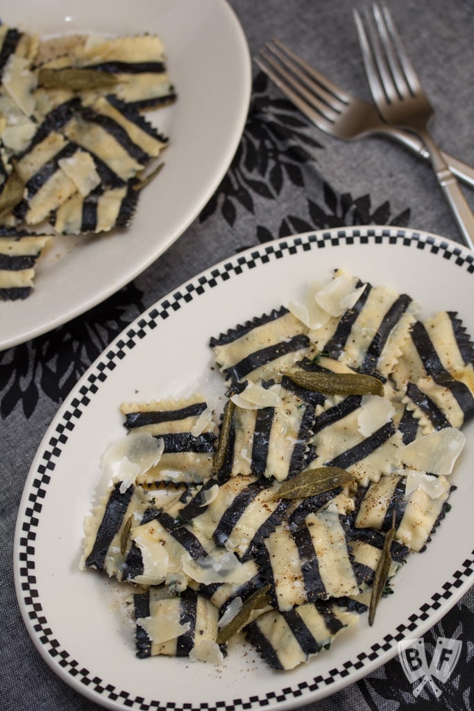 Ghost with the Most Roasted Sweet Potato Ravioli: Homemade black + white pasta is stuffed with roasted veggies, topped with brown butter sauce & crispy sage leaves in my Halloween tribute to Beetlejuice!