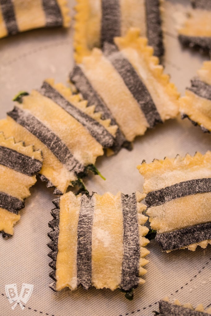 Ghost with the Most Roasted Sweet Potato Ravioli: Homemade black + white pasta is stuffed with roasted veggies, topped with brown butter sauce & crispy sage leaves in my Halloween tribute to Beetlejuice!