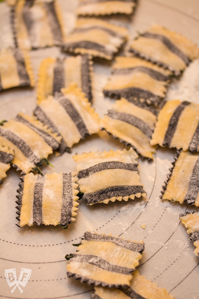 Ghost with the Most Roasted Sweet Potato Ravioli: Homemade black + white pasta is stuffed with roasted veggies, topped with brown butter sauce & crispy sage leaves in my Halloween tribute to Beetlejuice!
