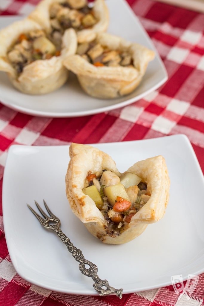 Puff pastry helps you make the most of your holiday leftovers with these easy bite-sized turkey pot pies. Perfect for Thanksgiving, Christmas or Easter!