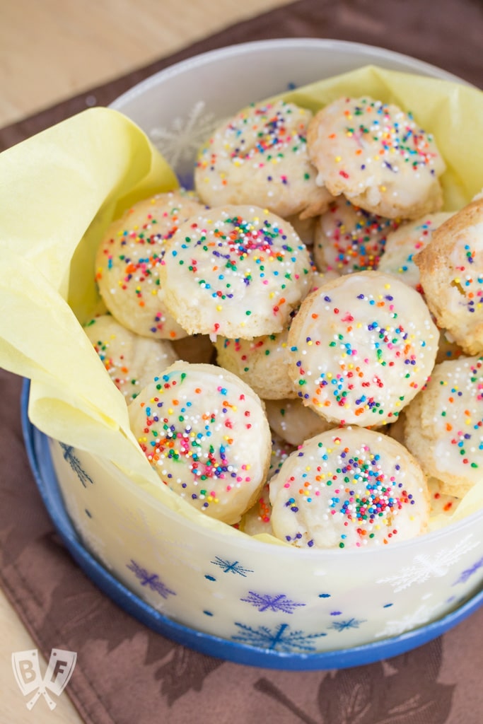 These ricotta cookies are a simple dessert recipe makes oodles of pillowy soft, tender cookies that are sure to be a family favorite! Perfect for cookie exchanges & holiday parties. They've been a family tradition for years!