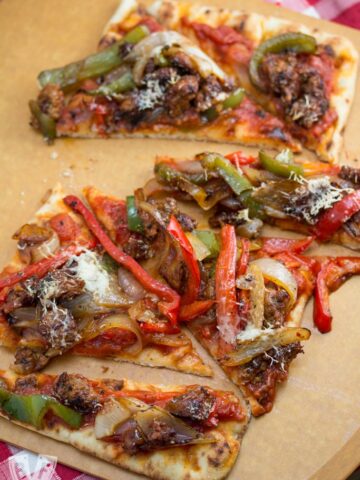 Spicy Italian Sausage and Peppers Pizza - Because what’s better than classic Italian comfort food in pizza form?