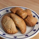 A plate of Turdilli & Chinudille Italian Christmas cookies