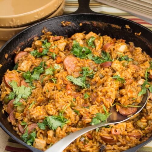 Overhead view of a Spanish Chicken + Sausage Skillet.