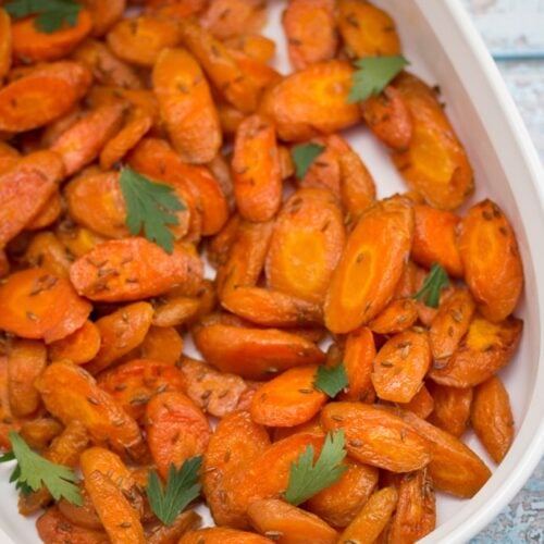 Baking dish of roasted carrots.