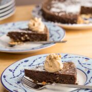 Chocolate cake slices on plates.