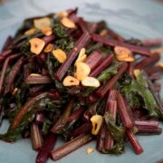 Sautéed beet greens with garlic chips.