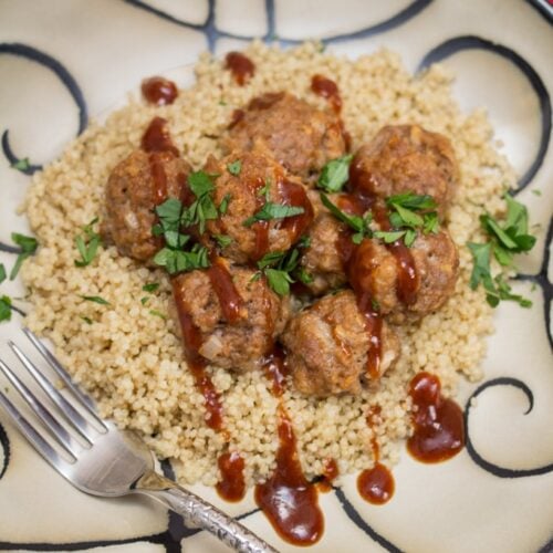 Maple-barbecue pork meatballs on top of rice.