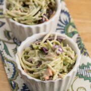 Two ramekins filled with broccoli slaw.