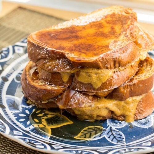 Stack of pumpkin pie-flavored Challah French toast.