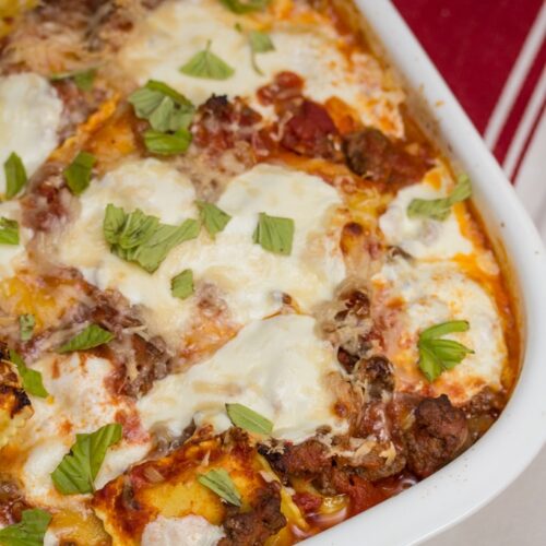 Overhead view of a casserole dish of ravioli lasagna.