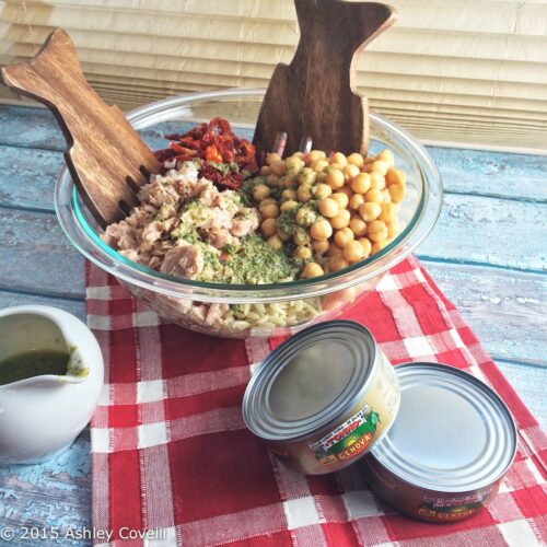 Bowl of ingredients ready to toss together to make tuna and orzo lettuce wraps.