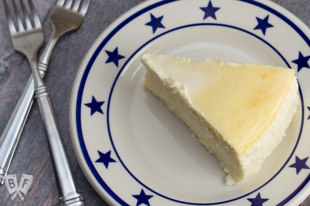 Overhead shot of a plate topped with a slice of Italian Cheesecake