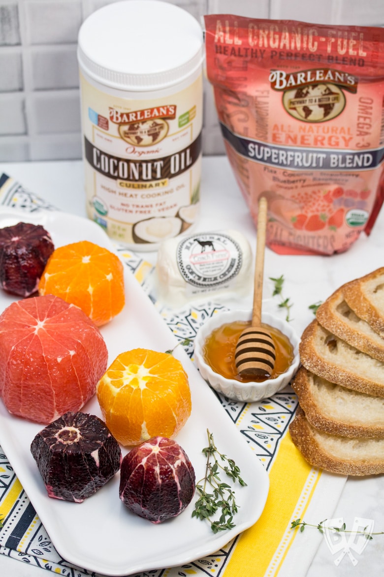 ¾ view of all the ingredients for Goat Cheese Toast with Honeyed Citrus Fruit.