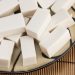 Overhead shot of a plate with rectangles of white coconut jelly.