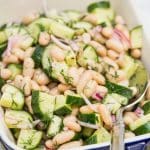 Overhead view of a dish of Cucumber & Cannellini Bean Salad with Dill.