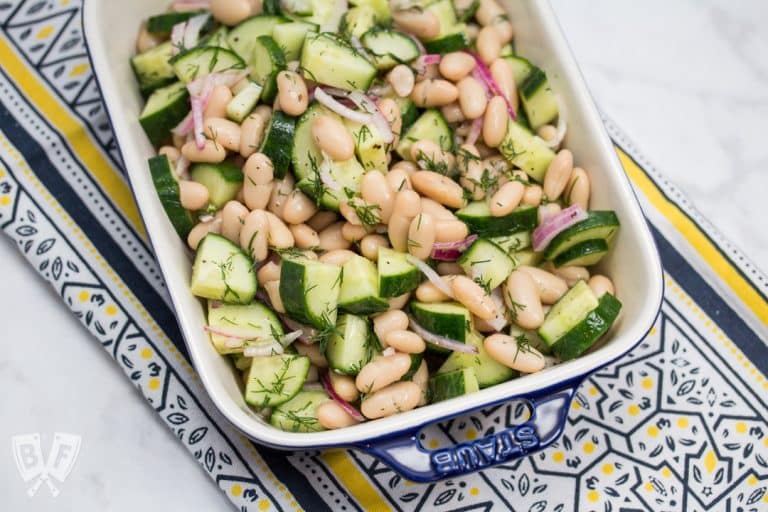 Overhead view of a dish of Cucumber & Cannellini Bean Salad with Dill