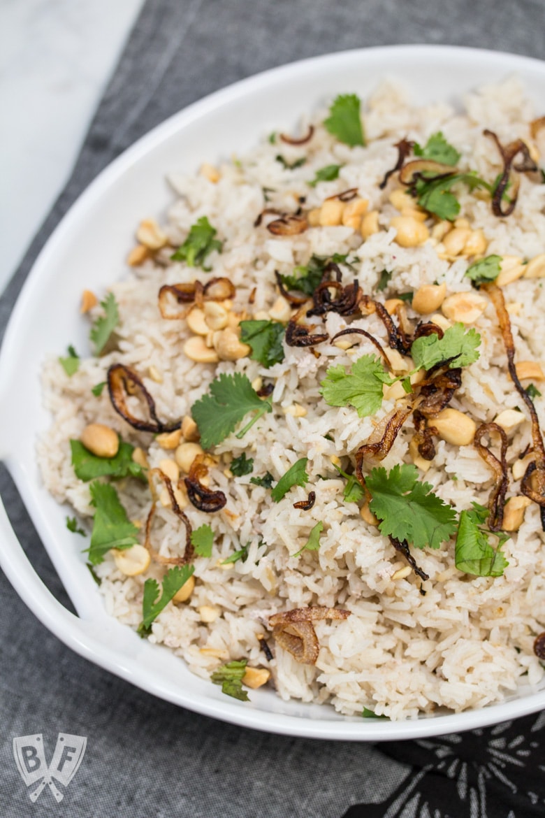 Overhead shot of a bowl of Peanutty Rice with Crispy Fried Shallots.