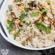 Overhead view of a bowl of Peanutty Rice with Crispy Fried Shallots.