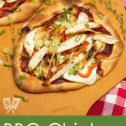Overhead view of BBQ Chicken Pizza with Smoked Mozzarella on a pizza peel.