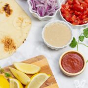 Overhead view of the ingredients for Falafel-Spiced Chickpea Flatbreads.