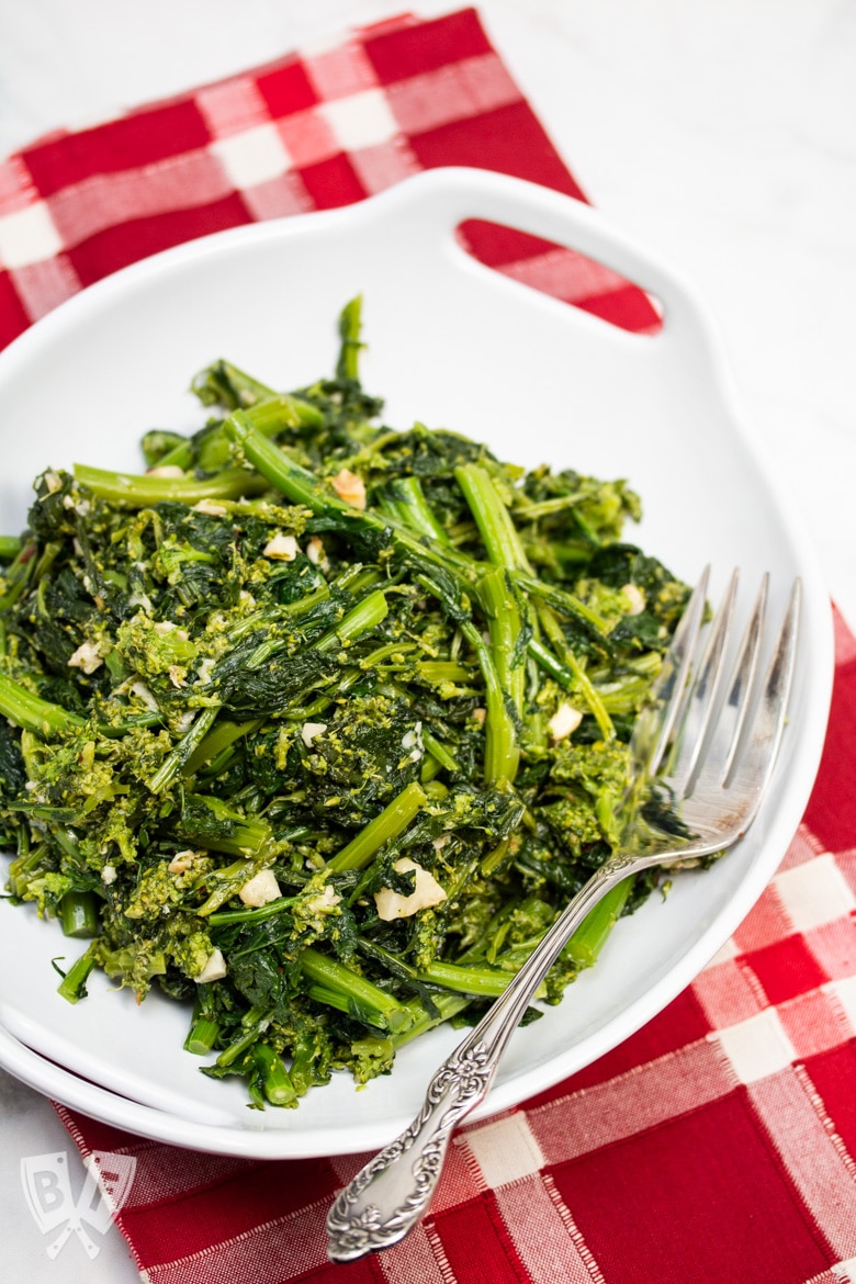 Overhead view of a bowl of garlicky broccoli rabe.