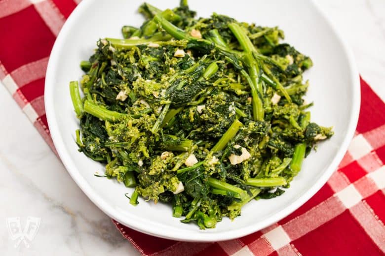 Overhead view of a bowl of garlicky broccoli rabe.