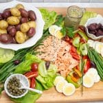 Overhead view of a King Salmon Niçoise Salad Board.