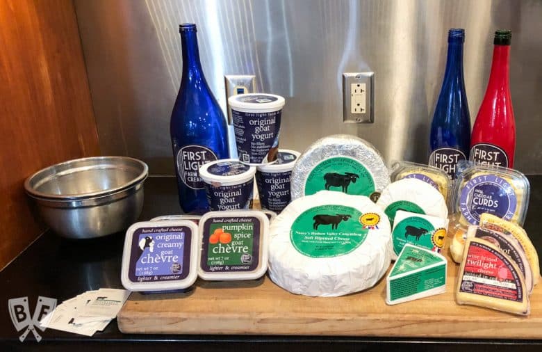 A selection of goat milk cheeses displayed on a board.