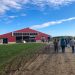Group of food bloggers walking up to Ivy Lakes Farm in Stanley, NY.