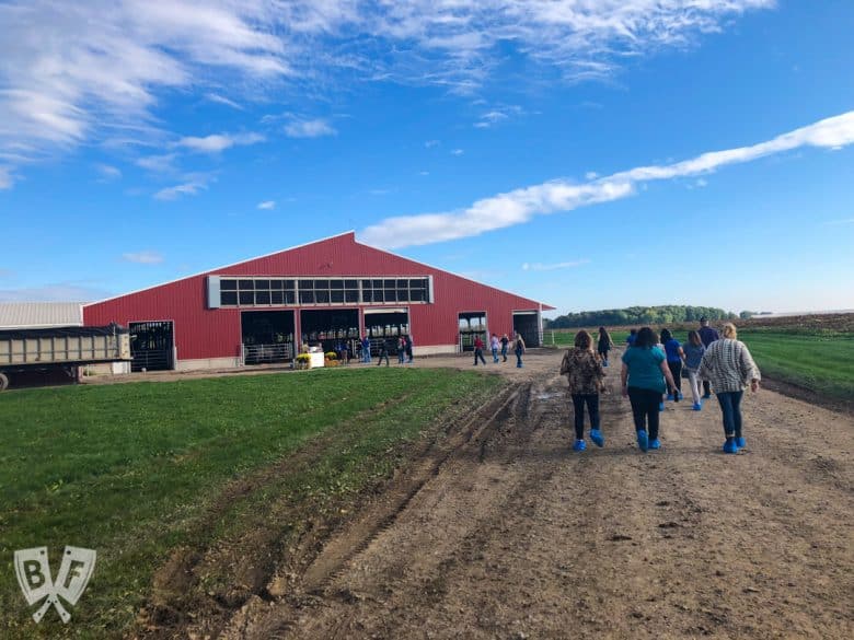 Group of food bloggers walking up to Ivy Lakes Farm in Stanley, NY.