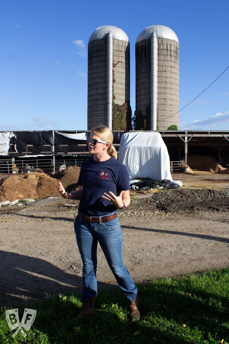 A farmer talking to a group of food bloggers on her farm.